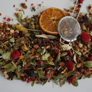 imgi 14 a heap of dried mixed herbs and fruit herbal tea ingredient with strainer